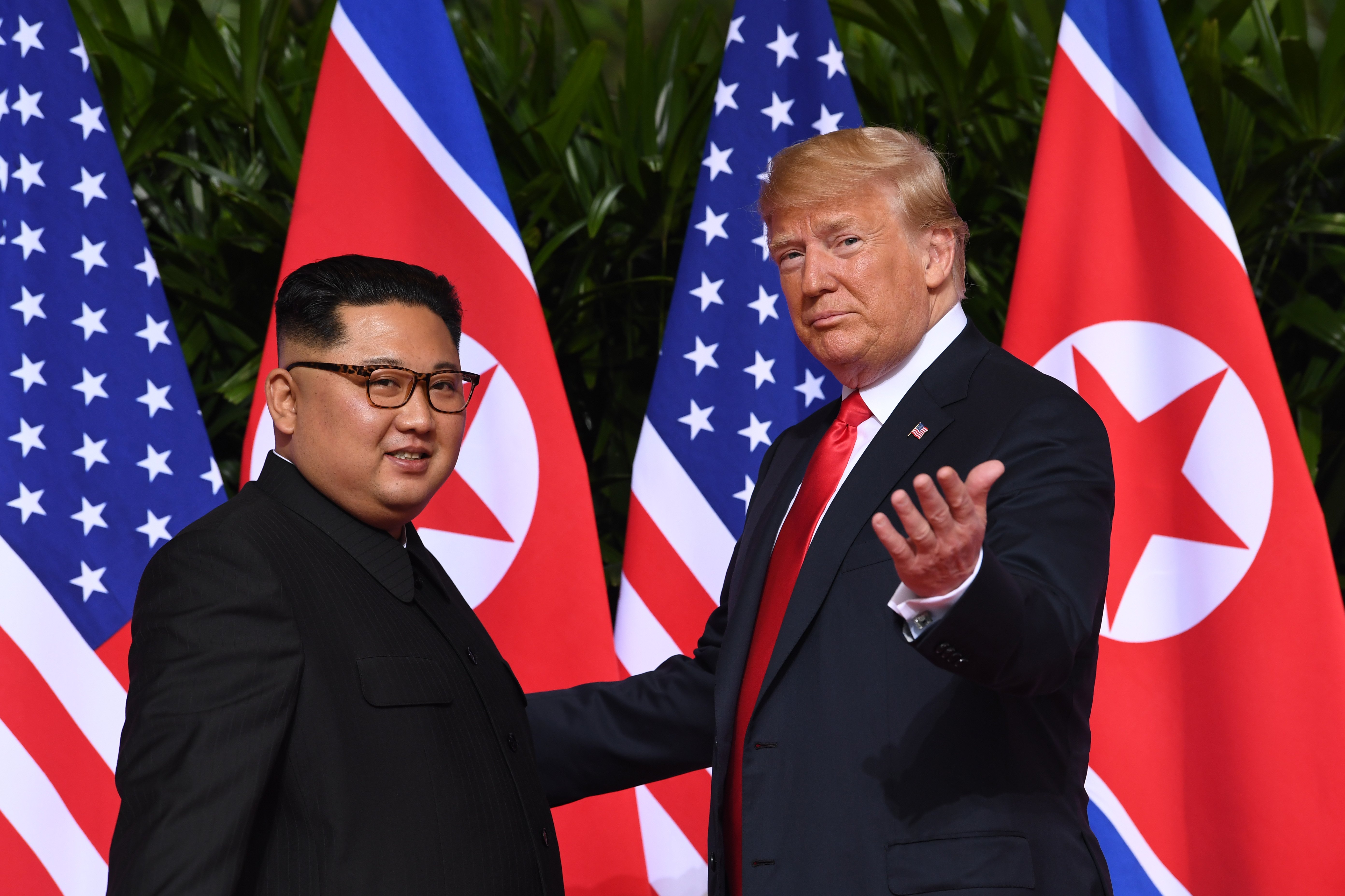 WWE Hall Of Famer & President Donald Trump Meets w/ North Korean Leader Kim Jong-Un (Photo Gallery)