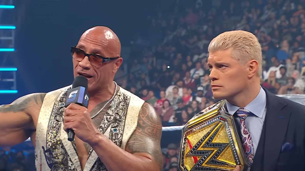 the rock wwe return big shown turn cody